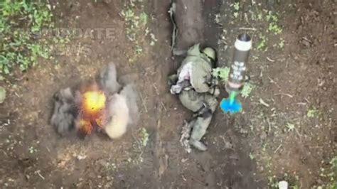 The grenade. . Grenade falls on russian soldiers